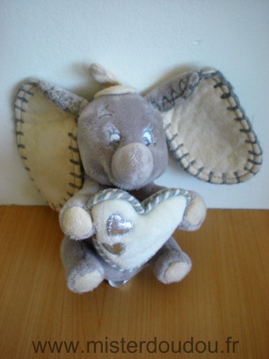 Doudou Eléphant Disney Dumbo gris tenant coeur 
