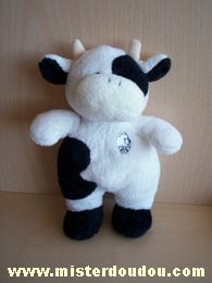 Doudou Vache Lascar Balnc noir avec une tête de nounours blanc brodé devant 