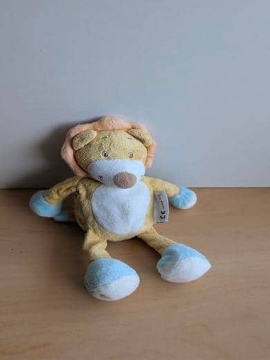 Amtoys Lion Jaune blanc bleu - Très bon état