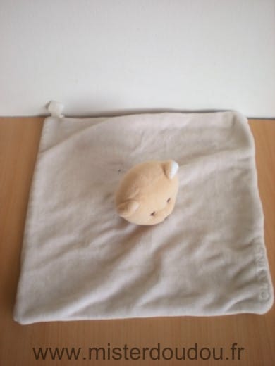 Ours Beige à pois blanc Clarins