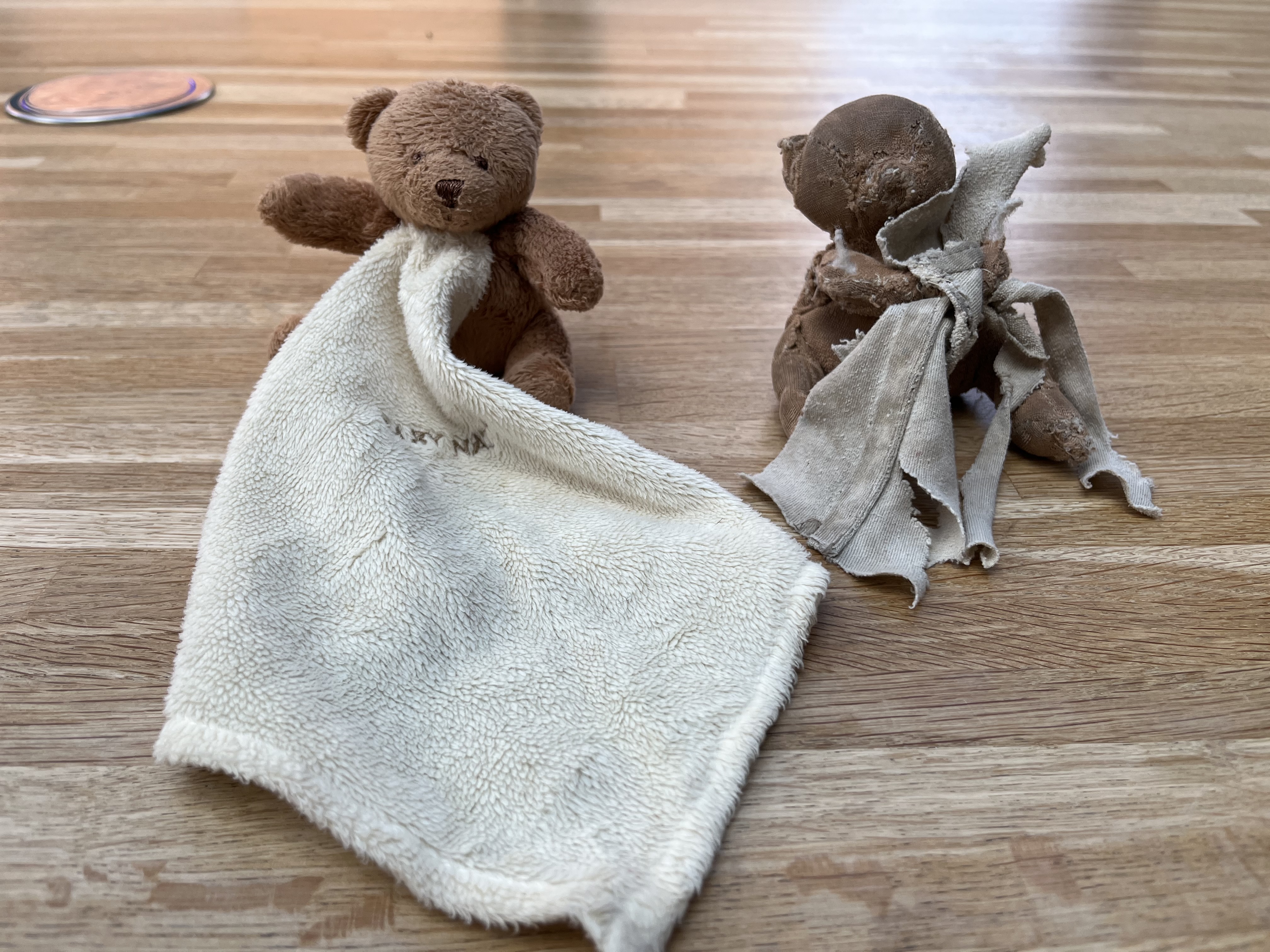 Doudou ourson marron et bavette perdu
