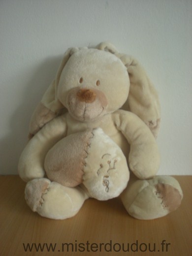 Nicotoy Lapin Ecru beige avec un coeur sur le ventre pour actionner la boite a musique - Très bon état