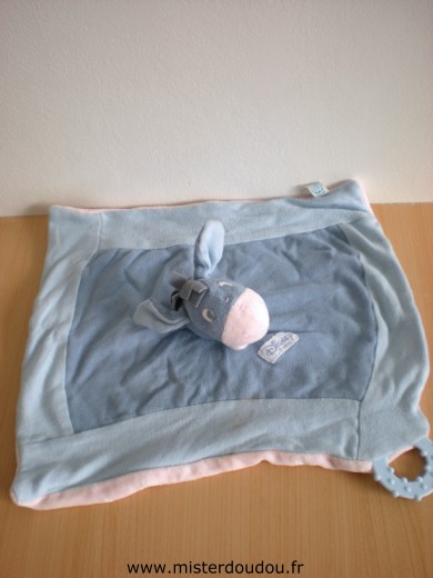 Doudou Ane Disney Bleu dessus rose dessous Bon état général mais une légère trace sur le tissus bleu