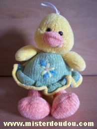 Doudou Canard Gipsy Jaune  robe verte avec fleur sur le ventre 