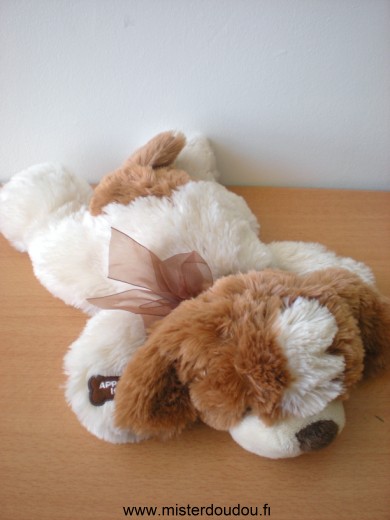 Doudou Chien Cobico Beige marron Tres bon état mais la boite sonore ne fonctionne plus