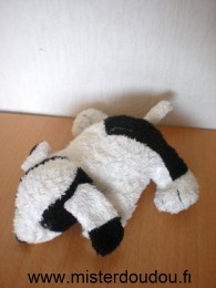 Doudou Chien - marque non connue - En tissus eponge noir blanc Billes noires pour les yeux , nez en plastique noir
ventre beige