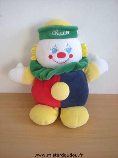 Doudou Clown Chicco Rouge bleu vert jaune A un pouet pouet dans ses pied