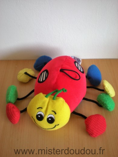 Doudou Coccinelle Eden Rouge jaune pattes bleu vert jaune mirroir sous le ventre 