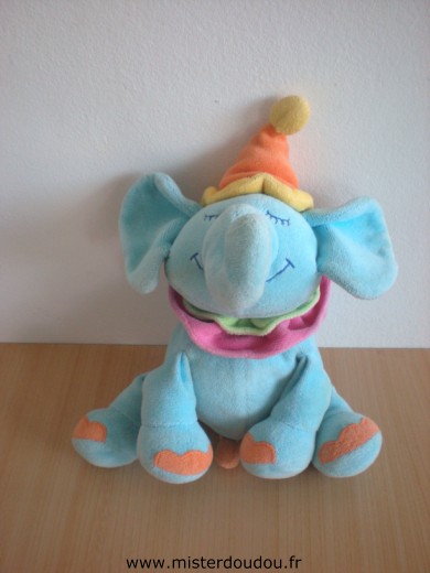 Doudou Eléphant 0 Bleu orange colerette rose vert Tissus usé par plusieurs passages en machine.
