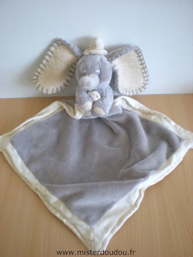 Doudou Eléphant Nicotoy Elephant gris dumbo tenant couverture 