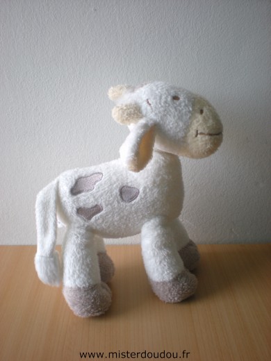 Doudou Girafe Babyclub Blanc taches marrons museau jaune Son ventre fait un bruit de papier froissé