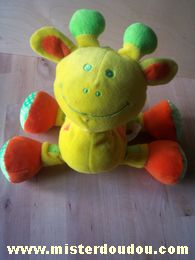 Doudou Girafe - marque non connue - Jaune orange vert Des traces noires 2euros + frais de ports