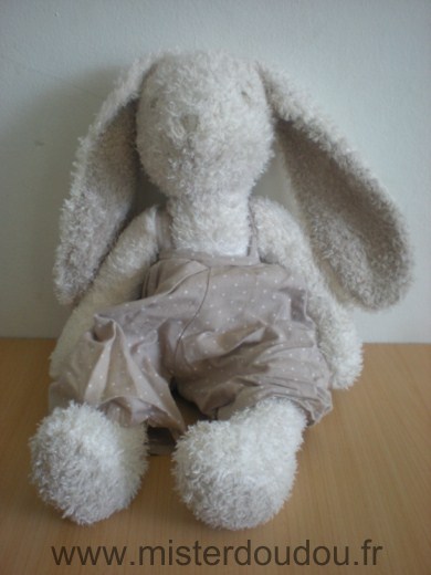 Doudou Lapin Cyrillus Ecru salopette bege à etoiles blanches 