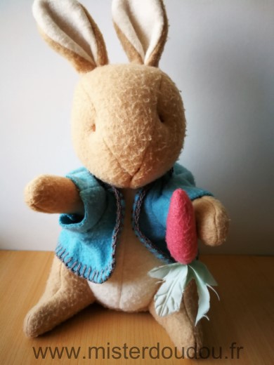 Doudou Lapin Eden Pierre lapin beige veste bleue En matiere polaire un peu bouloche