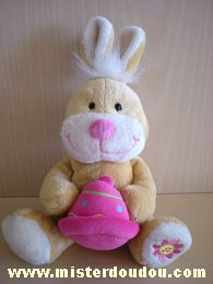 Doudou Lapin Gipsy Beige cloche rose Très bon état sauf boite à musique de fonctionne pas