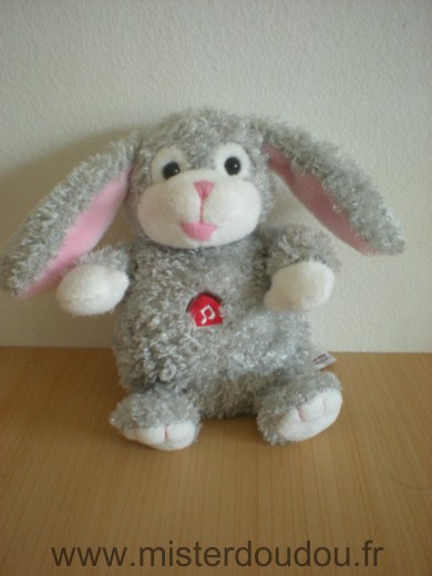 Doudou Lapin Gipsy Gris blanc rose Très bon état général mais la boite à musique ne fonctionne plus