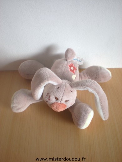 Doudou Lapin Nattou Beige ventre jaune avec une fleur orange sur le dos 