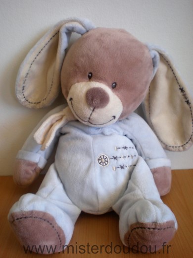 Doudou Lapin Nicotoy Bleu beige Tres bon etat general sauf le bout d une oreille tissus un peu use