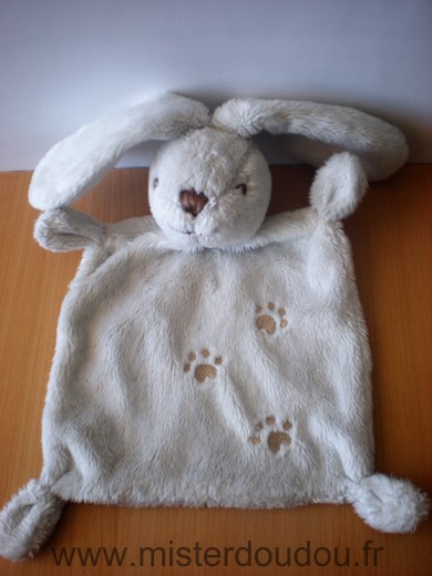 Doudou Lapin Nicotoy Gris clair empreintes Tres bon etat general mais quelques traces discretes non parties au lavage