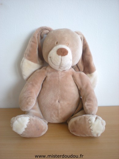 Doudou Lapin Nicotoy Marron Très bon état général mais boite à musique ne fonctionne pas et n'a plus son cordon pour déclencher la musique