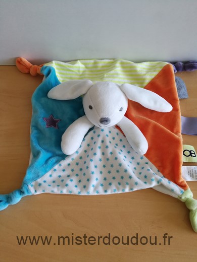 Doudou Lapin Obaibi okaidi Bleu blanc orange etoiles 