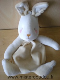 Doudou Lapin Sucre d orge Beige blanc Avec une poche dans le dos fermée par une fermeture éclaire