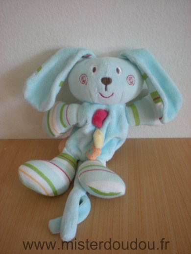 Doudou Lapin Sucre d orge Bleu pattes et oreilles rayees poche au dos avec attache sucette 