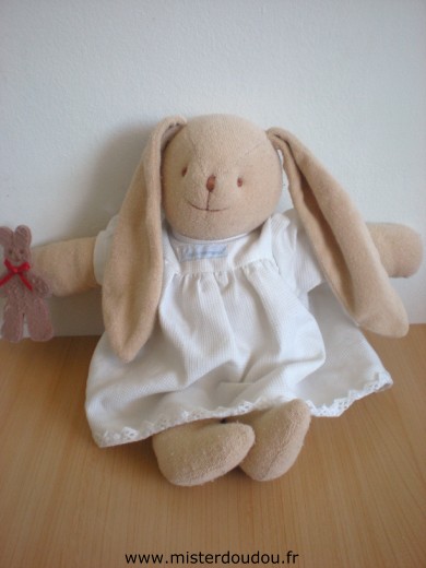 Doudou Lapin Trousselier Beige robe blanche Tissus un peu bouloché