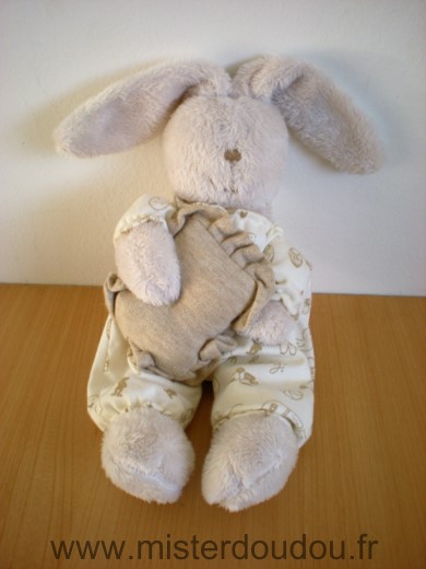 Doudou Lapin 0 Beige pyjama blanc motifs baby coussin beige 