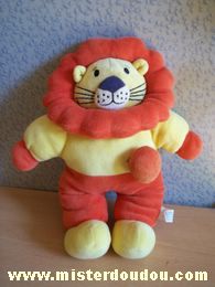 Doudou Lion Althans Jaune orange Lion musical quand on tire sur le pompon
possede une attache velcro derriere la tête
il a une legère trace sous la patte