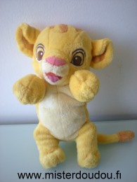 Doudou Lion Disney Simba jaune Manque la feuille verte