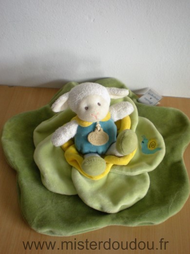 Doudou Mouton Doudou et compagnie Simon blanc bleu sur feuille salade verte 