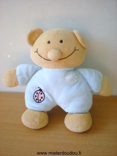 Doudou Ours 0 Beige bleu avec une coccinelle rose et une fleur blanche 
