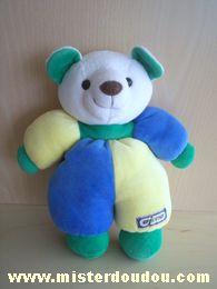 Doudou Ours Ajena Bleu jaune vert blanc Bon état général, sauf une légère trace derrière la jambe