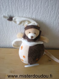 Doudou Ours Baby nat Beige marron blanc empruntes de pattes oranges Tres bon etat general sauf une ficelle d attache qui est coupee