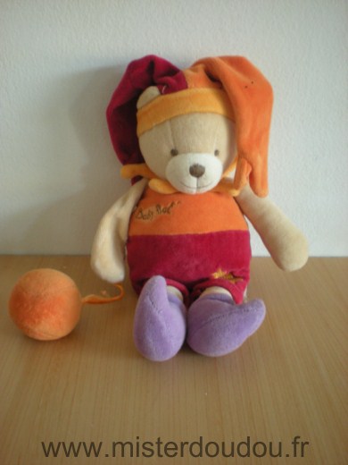 Doudou Ours Baby nat Orange rouge tenant ballon Bon état général sauf un bras décousu, le proposons petit prix pour dépanner