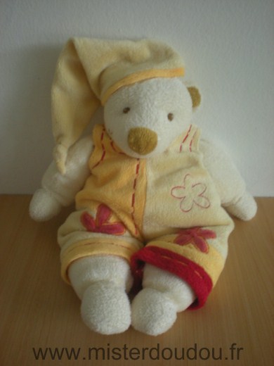 Doudou Ours Baby nat Salopette jaune orange fleur rouge 