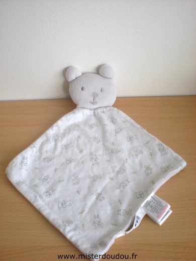 Doudou Ours Cocoon Tissus blanc motifs dessus, velours gris dessous 