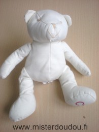 Doudou Ours Cyrillus Tissus ecru Cy rouge sous la patte