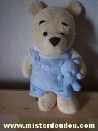 Doudou Ours Disney Beige salopette bleue Avec un petit ours accroché à la main et brodé 