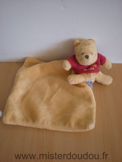 Doudou Ours Disney Winnie avec mouchoir jaune 