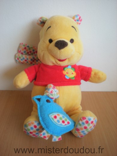 Doudou Ours Disney Winnie jaune rouge musical avec oiseau bleu 