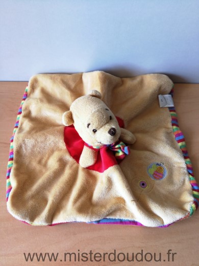 Doudou Ours Disney Winnie jaune rouge rayures dessous 