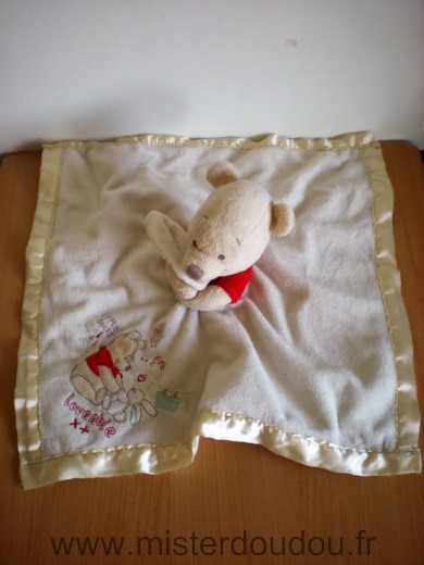 Doudou Ours Disney Winnie rouge couverture ecru liseret jaune so loveable 