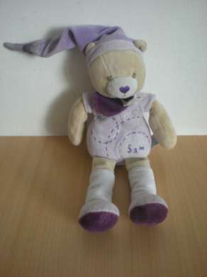 Doudou Ours Doudou et compagnie Sam mauve Bon état général mais bout du bonnet usagé