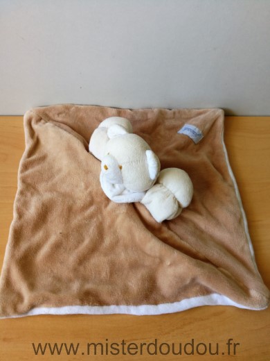 Doudou Ours Jacadi Beige blanc Tres bon état general sauf une trace sur la main