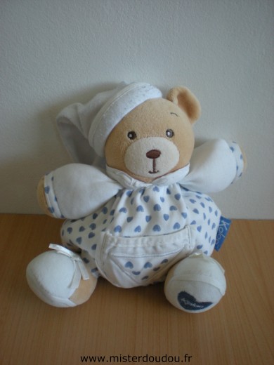 Doudou Ours Kaloo Blanc avec petits coeurs bleus Tissus du bonnet bouloché