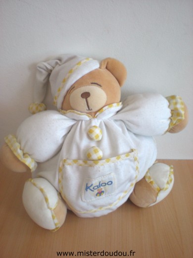 Doudou Ours Kaloo Blanc jaune Tissus un peu bouloché