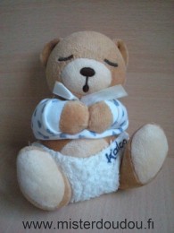 Doudou Ours Kaloo Marron pull blanc coeurs bleus couche blanche Ours couche culotte avec pressions en très bon état mais boite sonore ne marche pas