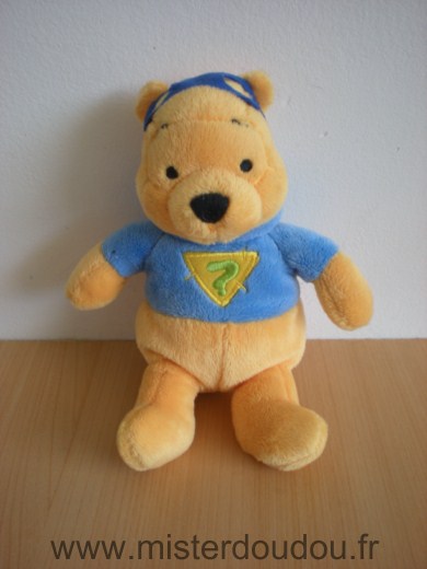 Doudou Ours Nicotoy Winnie disney jaune bleu masque bleu point d interrogation vert 